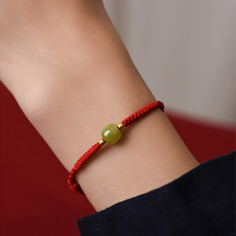 Adjustable red rope jade bracelet detailed craftsmanship close-up