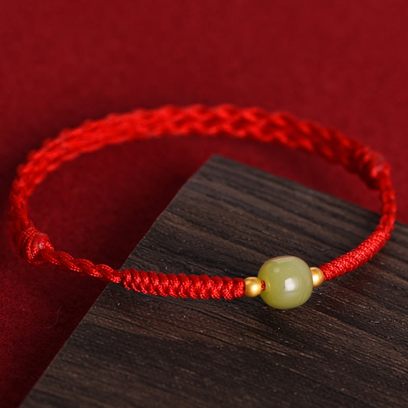 Red string bracelet with jade prosperity luck protection symbol