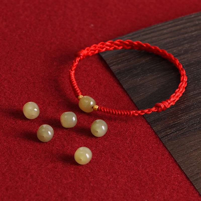 Light green hetian jade round bead red string bracelet pair