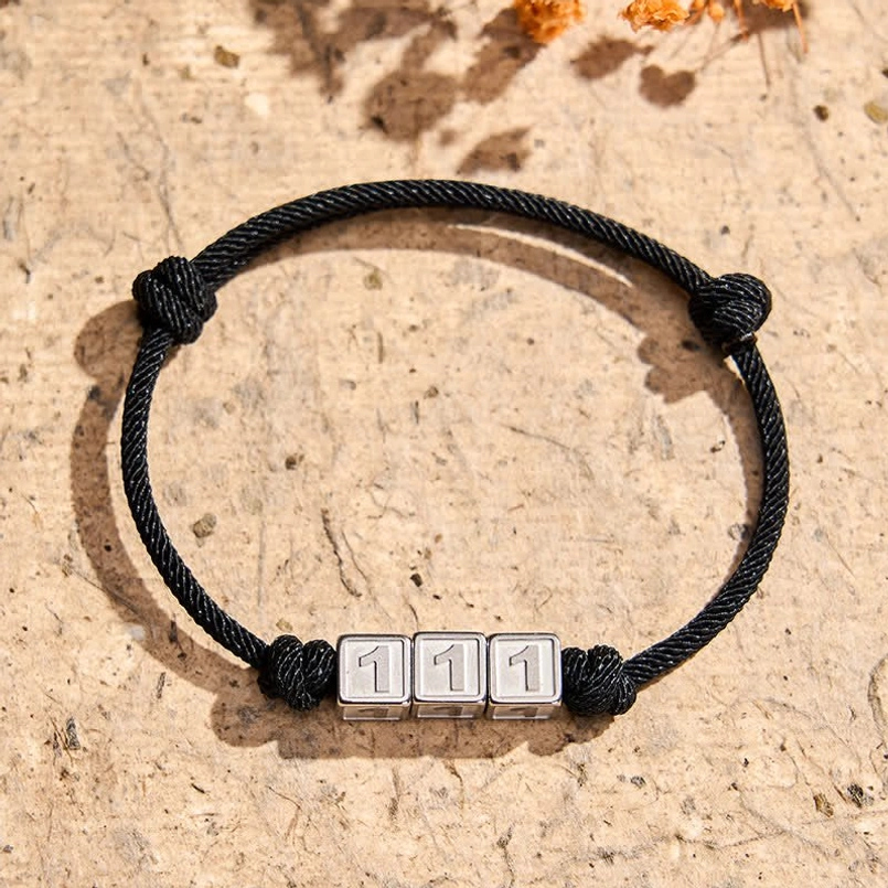 111 angel number adjustable black string bracelet with titanium charm