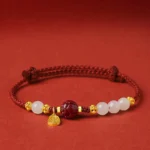 24K Gold Plated Hetian White Jade Cinnabar Lotus Red String Bracelet Front View