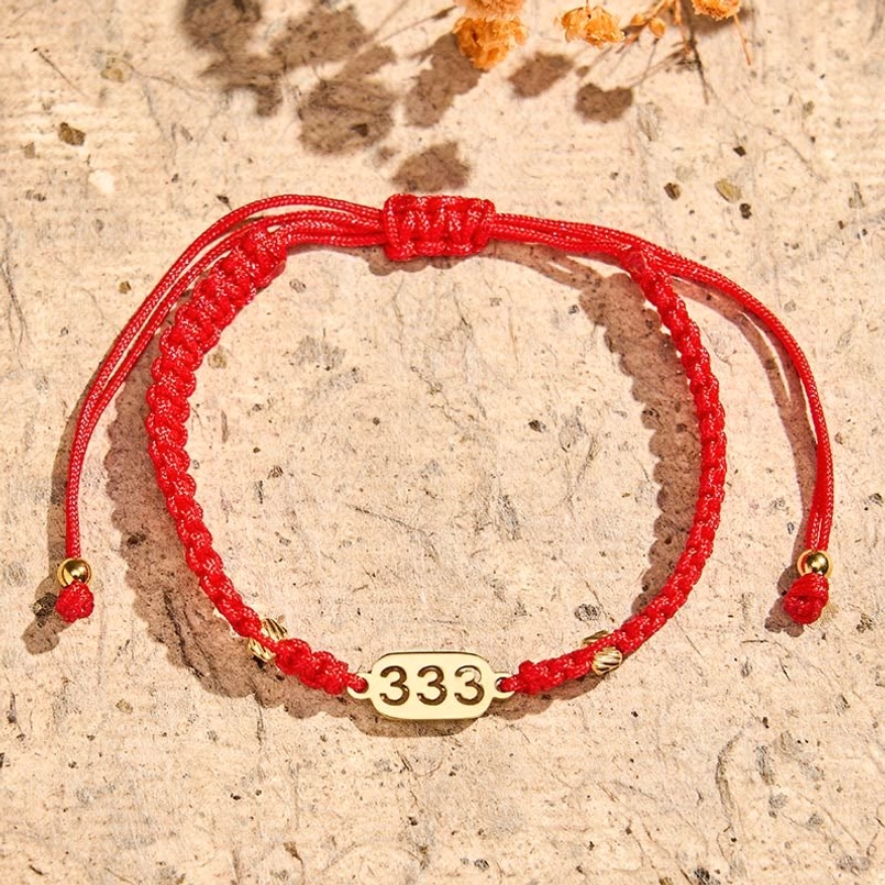 333 angel number red braided string bracelet front view with gold accents