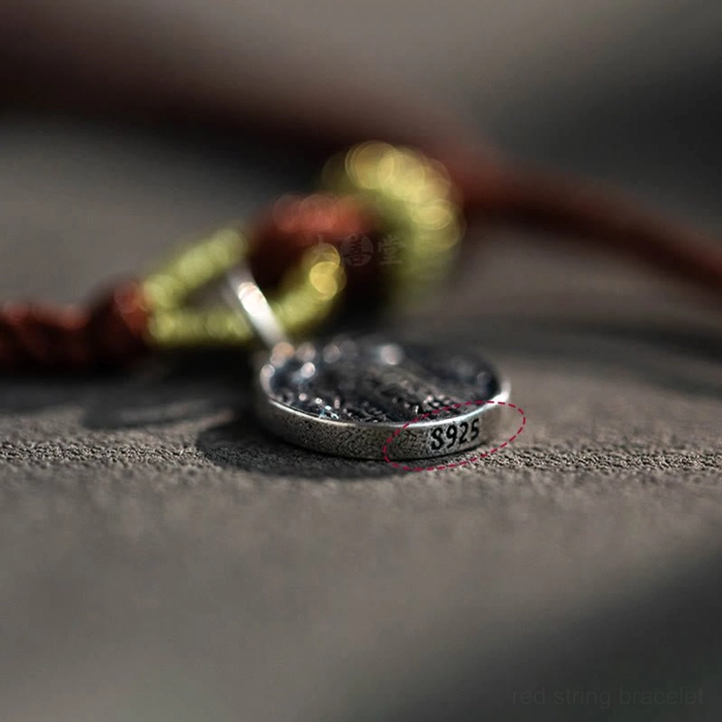 Side detail of S925 stamped five directions wealth gods silver charm