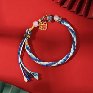 925 sterling silver gourd lucky red string bracelet flat lay on red background