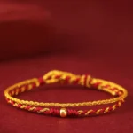 999 gold single bead red string braided bracelet front flat lay view