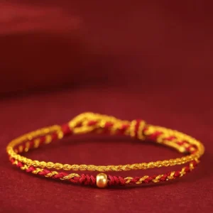 999 gold single bead red string braided bracelet front flat lay view