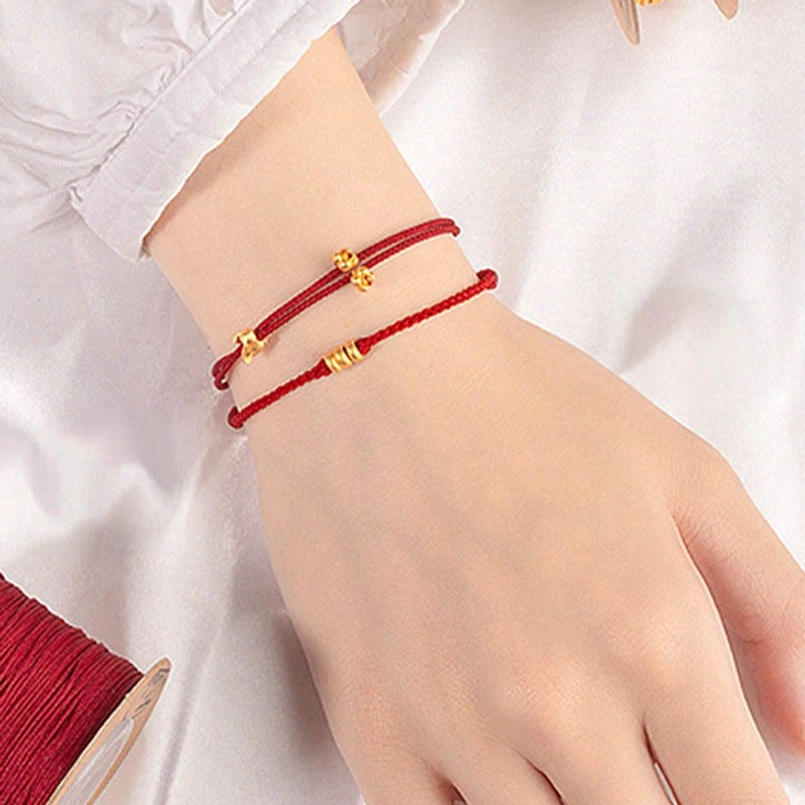 999 pure gold lucky rabbit red string bracelet detail shot of gold charm