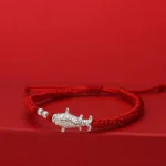 999 sterling silver koi fish red string luck bracelet front flat view on red background