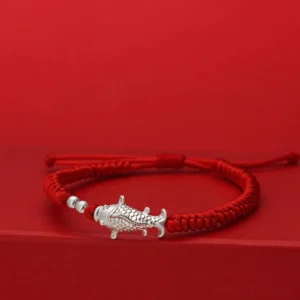 999 sterling silver koi fish red string luck bracelet front flat view on red background