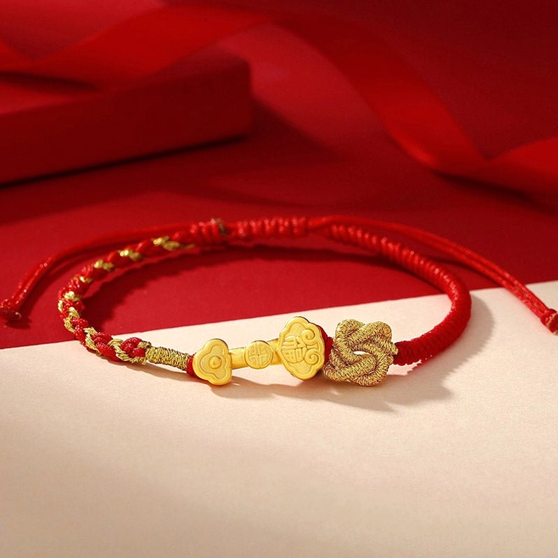 999 Sterling Silver Ruyi Fu Character Red String Fortune Bracelet Flat Lay