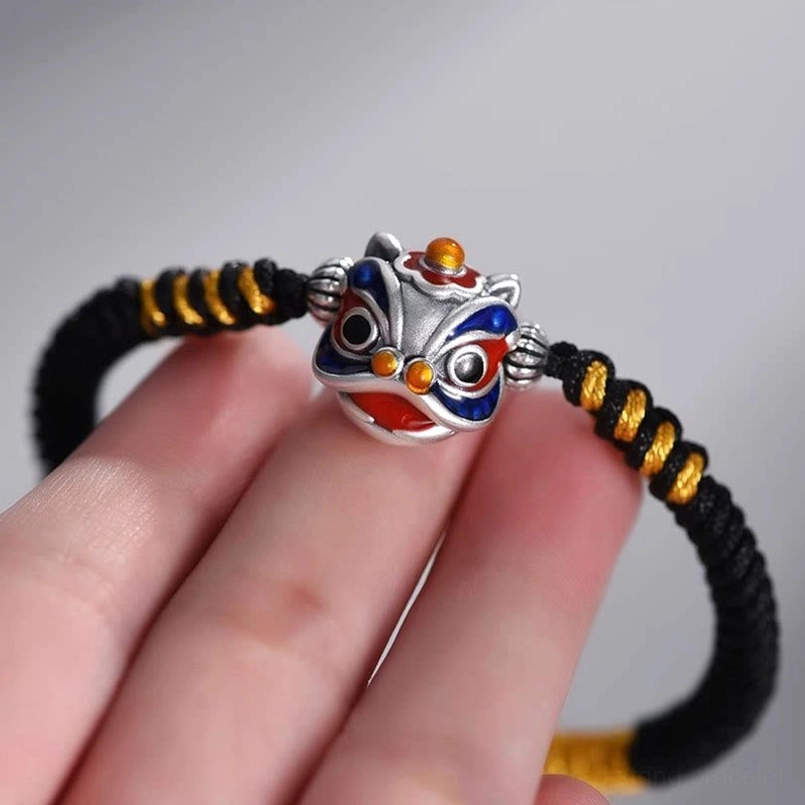 Adjustable dancing lion luck braided bracelet with black yellow rope and protection charm