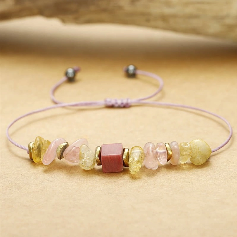 Adjustable pull-string crystal healing bracelet with light purple wax cord and sliding knot