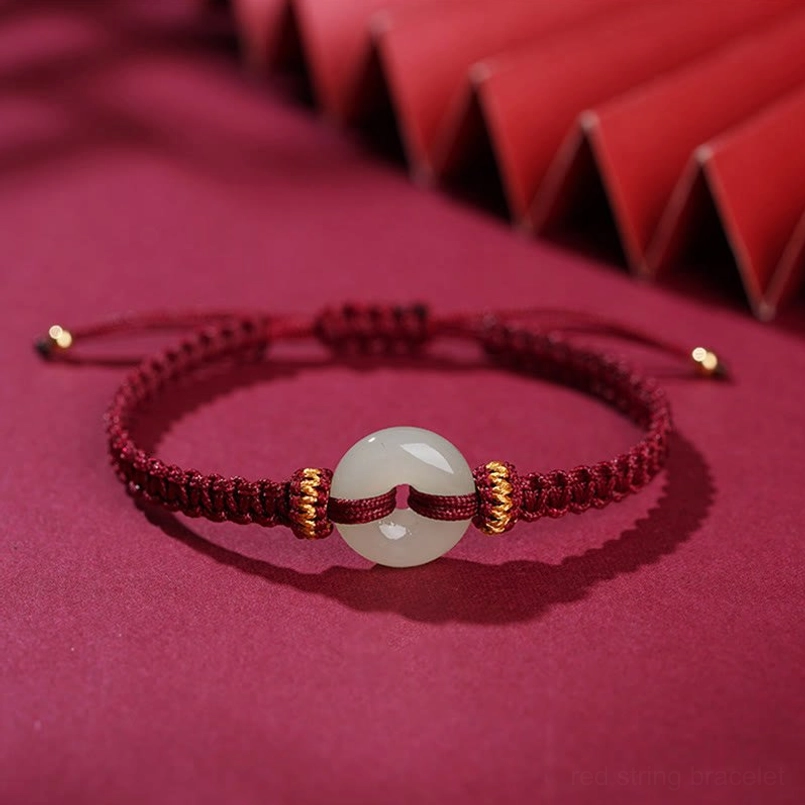 Adjustable jade peace buckle braided bracelet with gold accent tips
