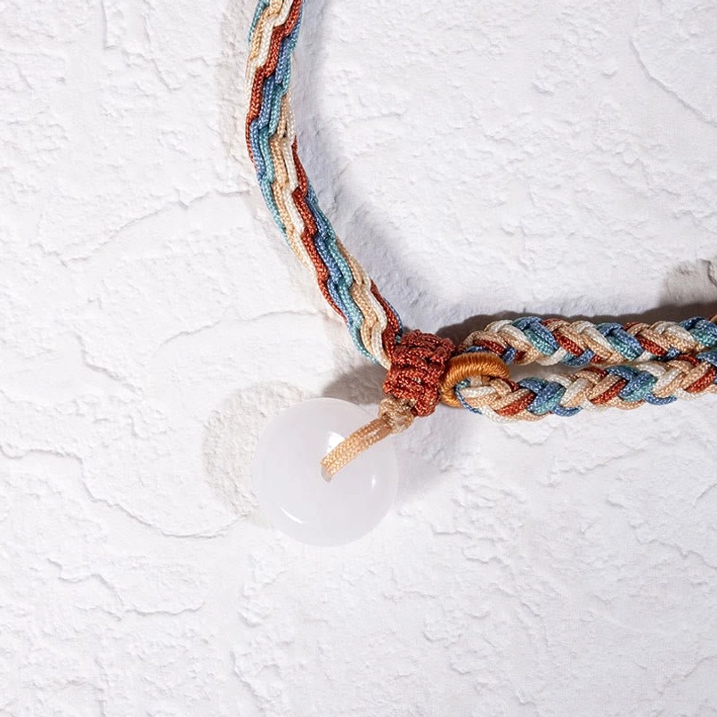 Side View of Adjustable Knot Hetian Jade Peace Buckle Red String Bracelet