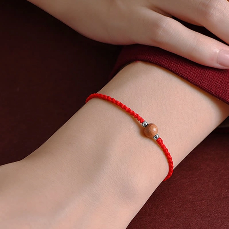 Adjustable peach wood red string bracelet - wrist circumference 14-17cm natural materials