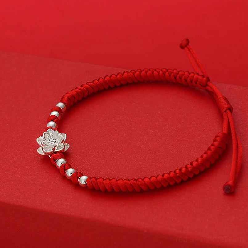 Adjustable red string bracelet multiple silver beads knotted ends silver lotus charm