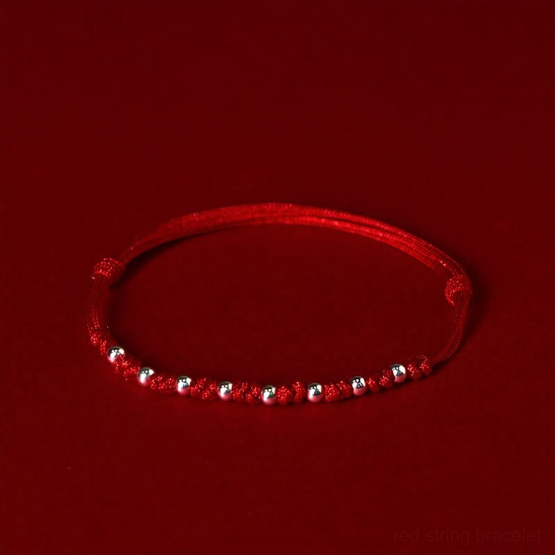 Adjustable red string bracelet with 925 sterling silver beads and sliding knot closure