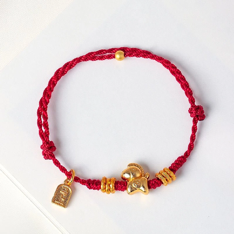 Adjustable Chinese zodiac horse red string bracelet on white background