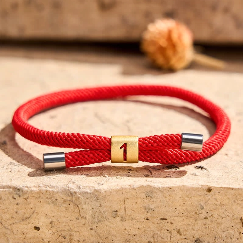 Angel number 1 protection bracelet low angle close-up with dried flowers