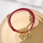 Angel number red string braided bracelet with gold charms - handcrafted luxury design