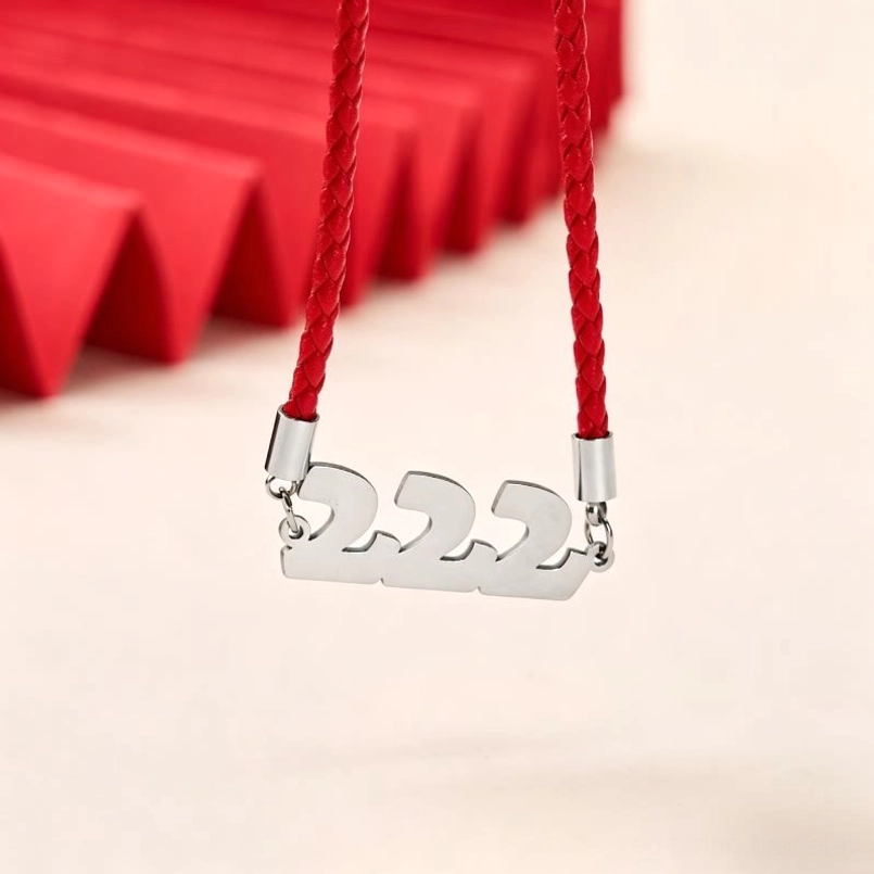 Angel Numbers 222 silver tone pendant red string bracelet detail view