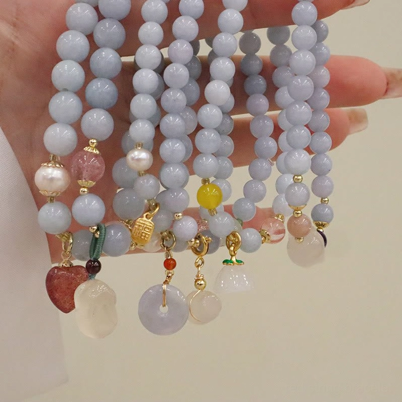 Premium aquamarine chalcedony bracelet with multiple charm styles and natural gemstone beads