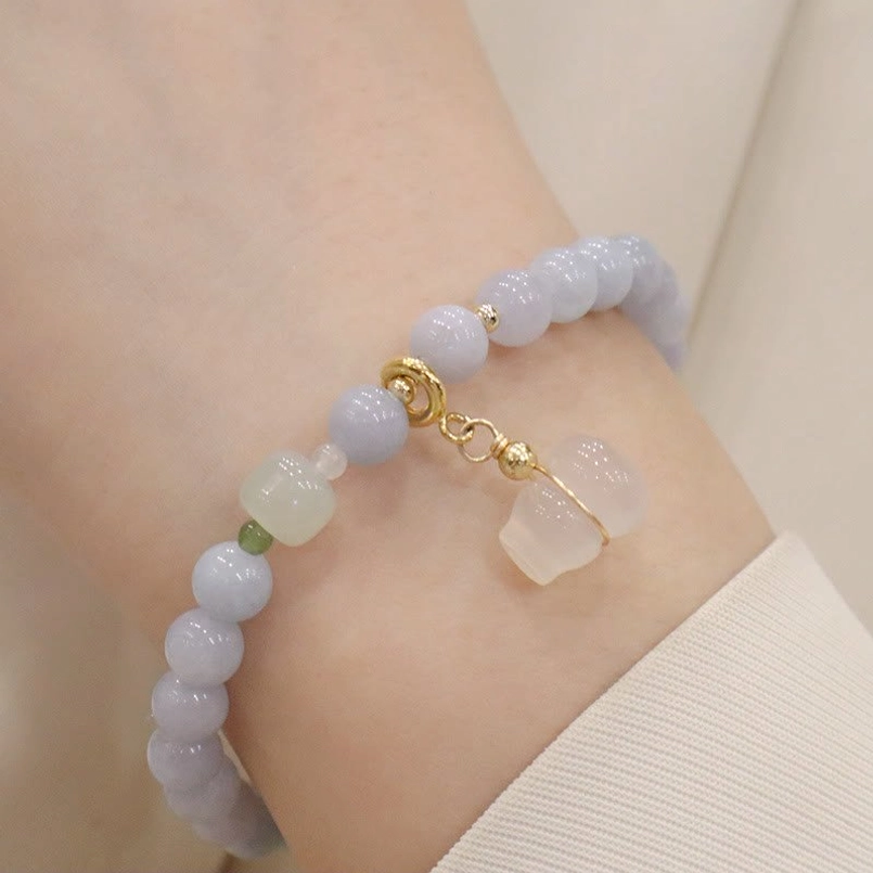 Aquamarine gourd charm bracelet with light blue beads, freshwater pearl and clear gourd pendant