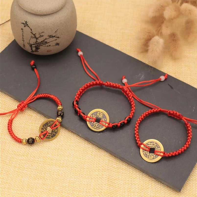 Assorted copper coin red string bracelets with various styles, Chinese traditional design