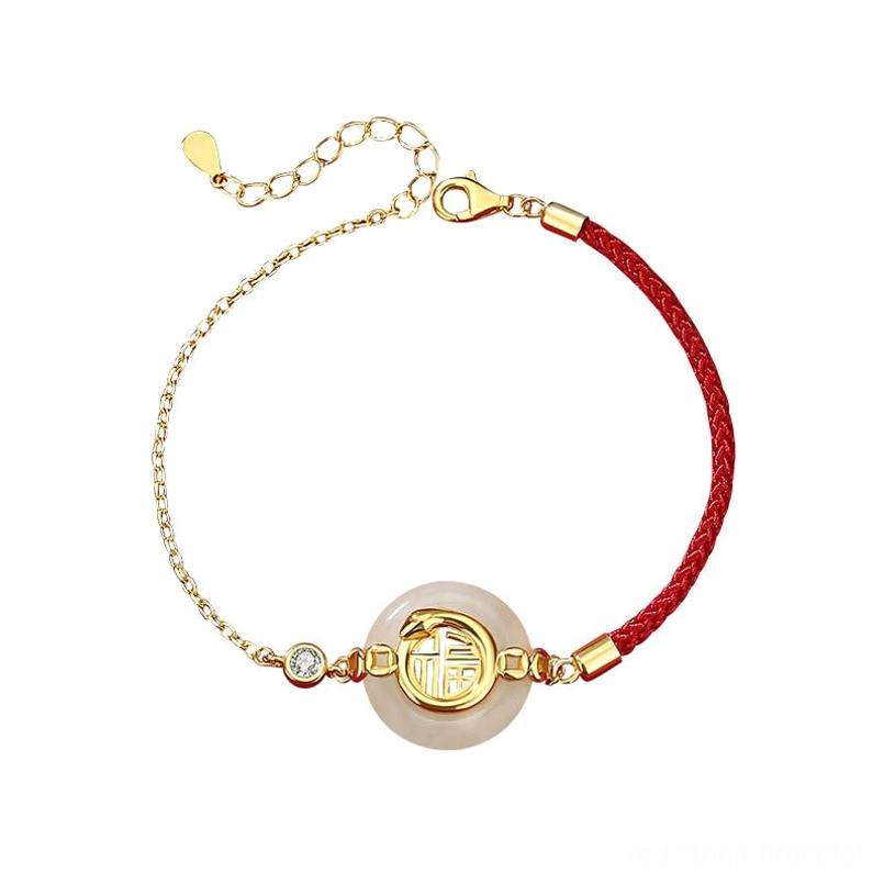925 sterling silver Hetian jade red string bracelet on plain white background