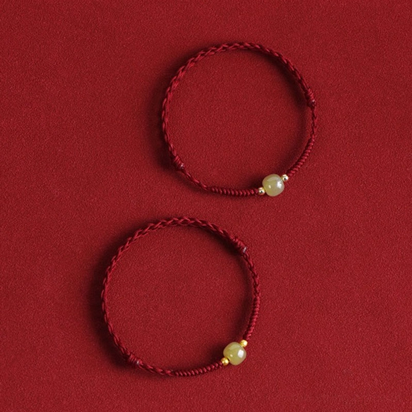 Barrel jade beads gold spacers dark red twisted cord bracelets
