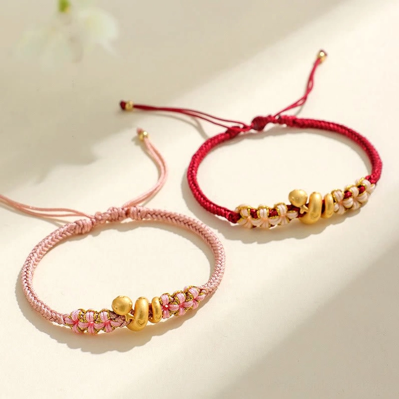 Bisque beige string 999 sterling silver snake charm bracelet product shot