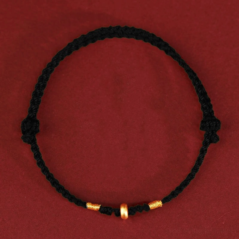 Black braided lucky bracelet with gold spacer beads spiritual protection