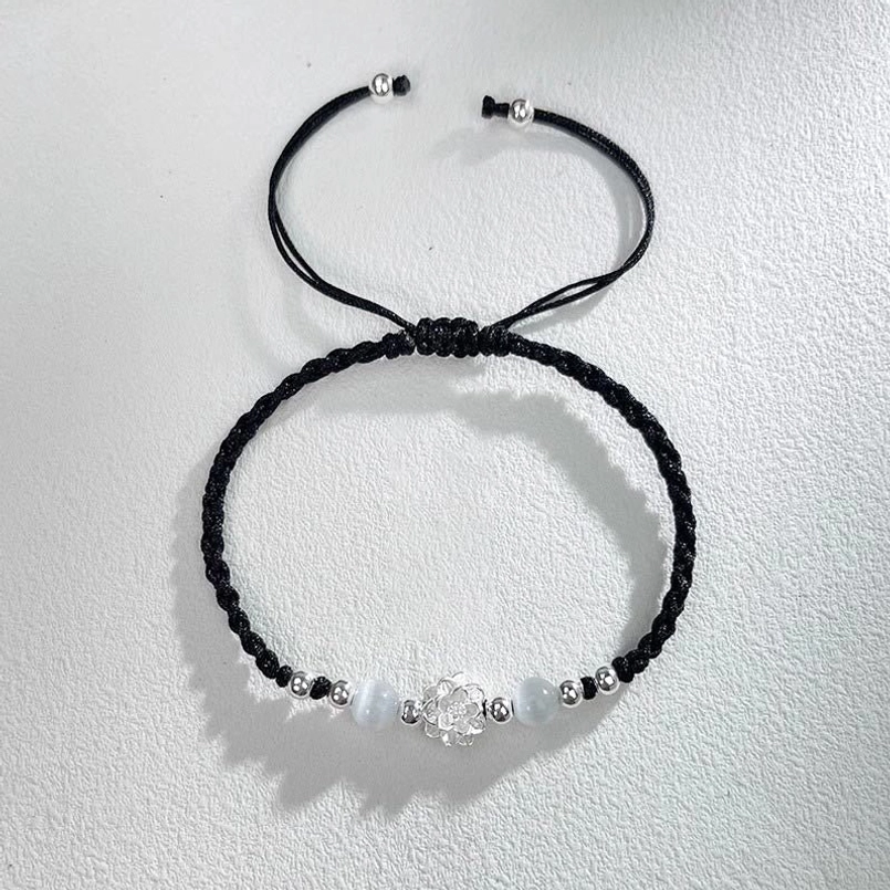 black braided red string bracelet with 999 silver lotus charm front view