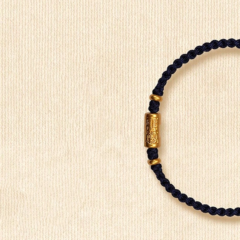 Black braided lucky bracelet with 999 gold carved amulet - modern style