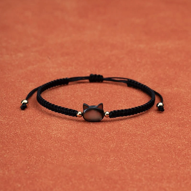 Black cat head shell charm red string protection bracelet front view