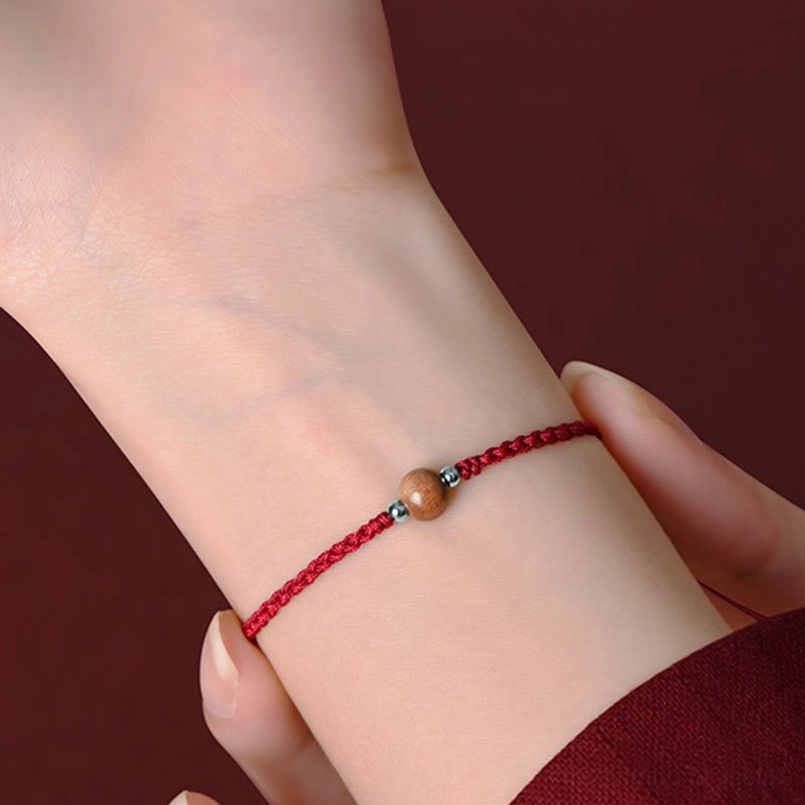 Black cord peach wood bead bracelet - evil spirit repelling protection talisman
