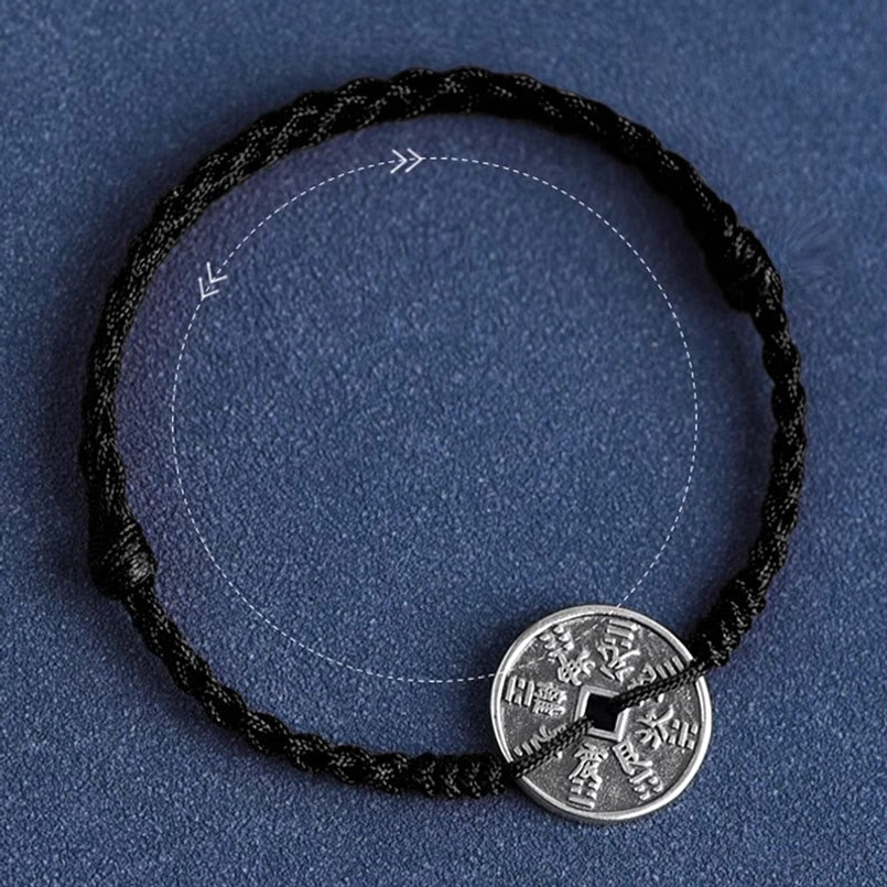Black hand-woven cord with sterling silver lucky coin protection bracelet