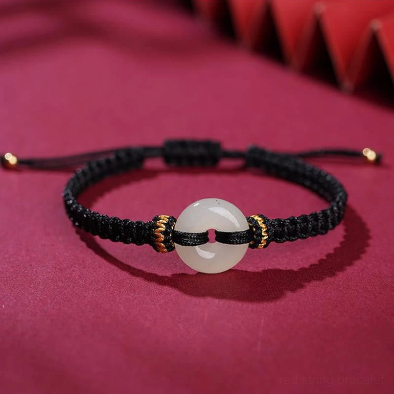 Black braided string bracelet with natural jade peace buckle