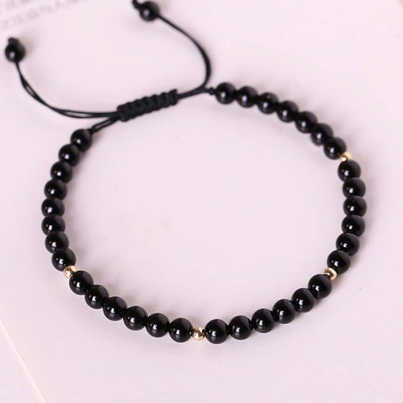 Black obsidian 4mm beaded bracelet with braided adjustable cord and gold metal accents