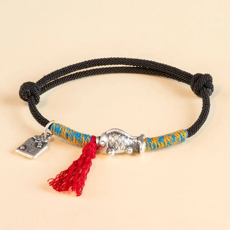 Black red string koi fish protection bracelet with silver charm detail