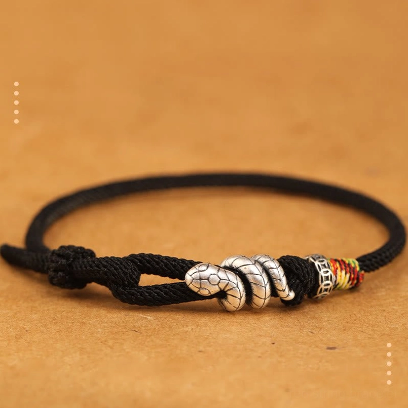 Black protective red string bracelet with silver snake charm, spiritual and protective design
