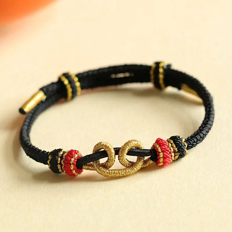 Black Woven Ingot Pattern Protection Bracelet Flat Lay View
