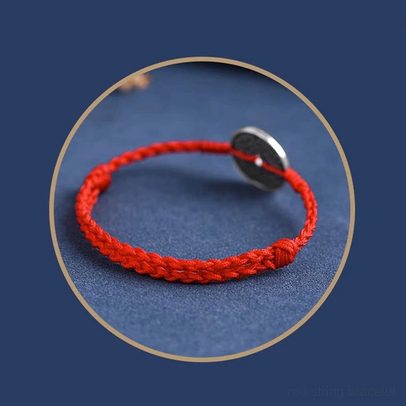 Black rope protection bracelet with 925 sterling silver coin detail