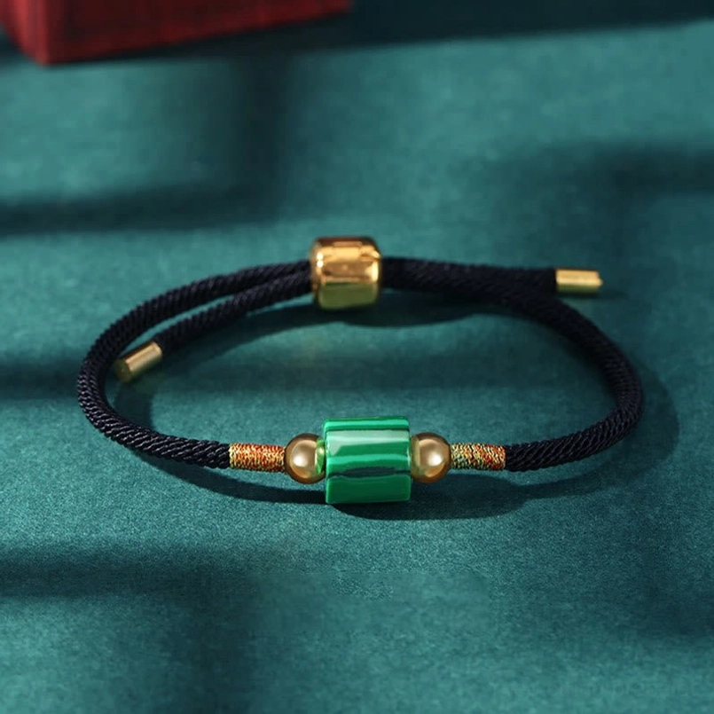 Black rope Tibetan protection bracelet with malachite stone bead for spiritual grounding