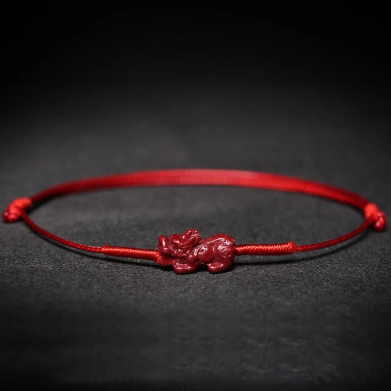 Black cord bracelet with fu auspicious character charm