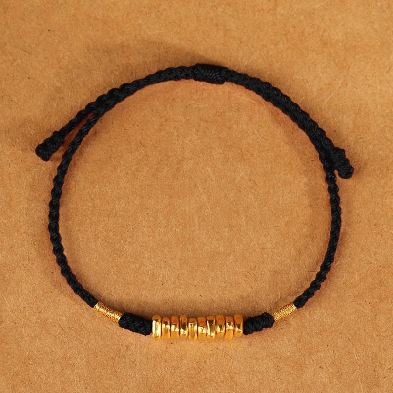 Black string bracelet with gold beads protective talisman