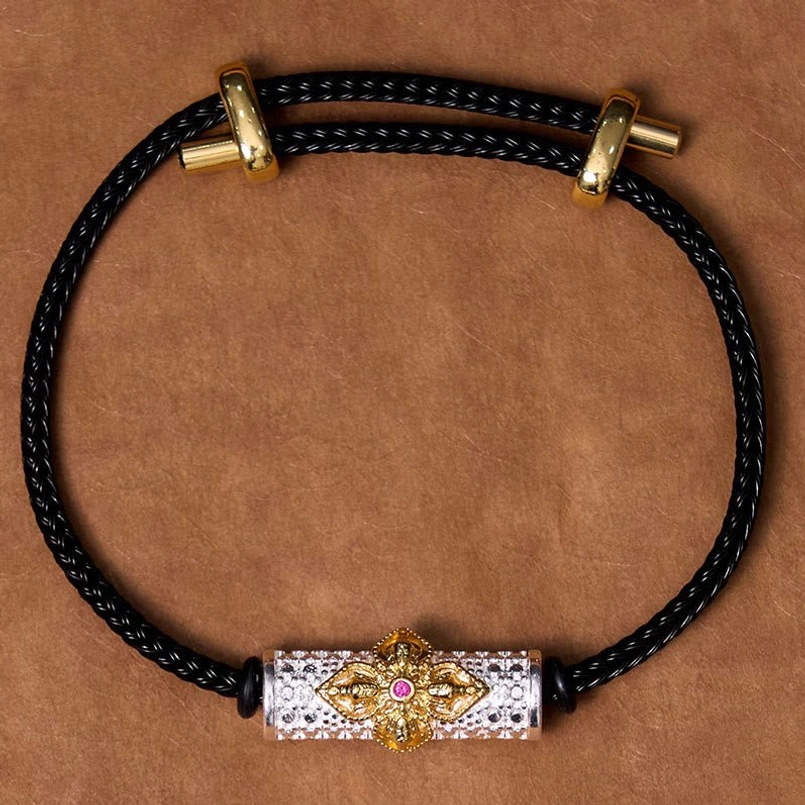 Copper luck red string bracelet with black cord variant showing flower charm design
