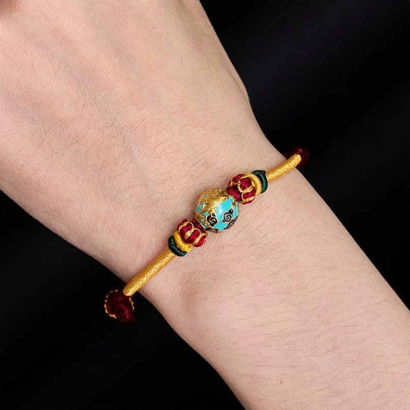 Black string dragon bead bracelet offering protection and strength