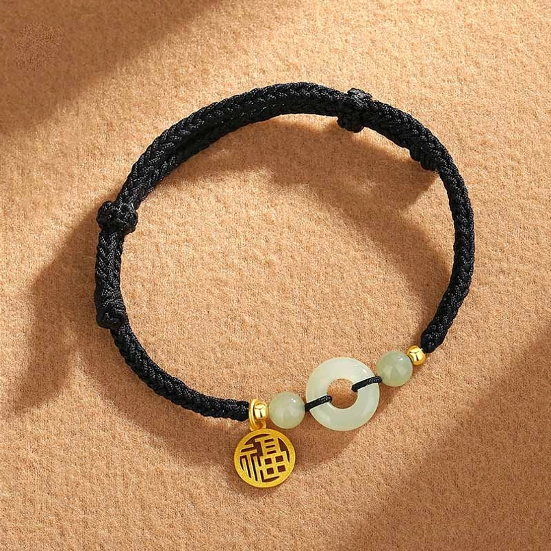 Black woven Hetian jade peace buckle 925 silver Fu charm bracelet top view
