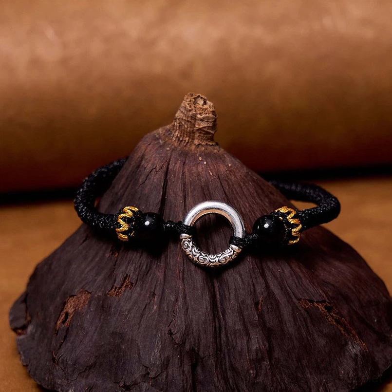 Black braided peace buckle protection bracelet with silver agate beads adjustable cord